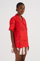 Profile view of model wearing the Oroton Broderie Camp Shirt in Poppy and 100% Linen for Women
