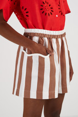 Profile view of model wearing the Oroton Capri Stripe Short in Iced Chocolate and 100% Linen for Women