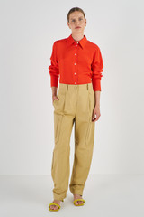 Profile view of model wearing the Oroton Zip Detail Pant in Wheat and 77% Cotton 23% Linen for Women