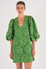 Profile view of model wearing the Oroton Short Lace Dress in Garden and 100% Polyester for Women