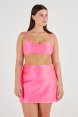 Profile view of model wearing the Oroton Satin Bralette in Candy Pink and 85% Polyester, 15% Silk for Women