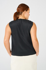 Profile view of model wearing the Oroton Silk Shell Top in Black and 92% silk, 8% spandex for Women