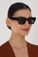 Profile view of model wearing the Oroton Stevie Sunglasses in Black and Acetate for Women