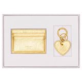 Front product shot of the Oroton Eve Credit Card Sleeve And Heart Keyring Set in Gold and Pebble leather for Women