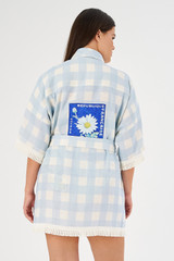 Profile view of model wearing the Oroton Patched Gingham Robe in Pale Blue and 100% linen for Women