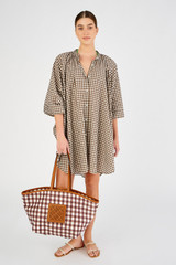 Profile view of model wearing the Oroton Gingham Print Kaftan in Chocolate and 100% cotton for Women