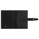Internal product shot of the Oroton Fife Passport Sleeve in Black and Pebble leather for Women