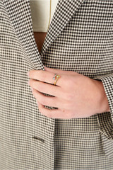 Profile view of model wearing the Oroton Sphere Split Ring in 18K Gold/Silver and Recycled 925 Sterling Silver for Women