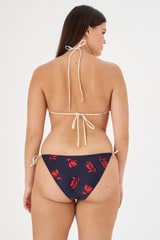 Profile view of model wearing the Oroton Dutch Tulip Bikini Bottom in North Sea and 78% polyamide, 22% elastane for Women