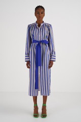 Profile view of model wearing the Oroton Positano Stripe Shirt Dress in Swedish Blue and 100% Cotton for Women