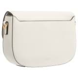 Back product shot of the Oroton Yvonne Small Saddle Bag in Cream and Pebble Leather for Women