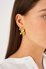 Profile view of model wearing the Oroton Lucia Earrings in Worn Gold and Brass for Women