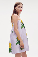 Profile view of model wearing the Oroton Golden Posie Print Mini Dress in Lilac and 100% silk for Women