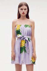 Profile view of model wearing the Oroton Golden Posie Print Mini Dress in Lilac and 100% silk for Women