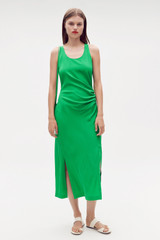 Profile view of model wearing the Oroton Jewel Green Midi Dress in Jewel Green and 100% silk for Women