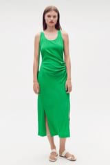 Profile view of model wearing the Oroton Jewel Green Midi Dress in Jewel Green and 100% silk for Women
