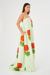 Profile view of model wearing the Oroton Posie Geranium Print Gown in Sea Spray and 100% linen for Women