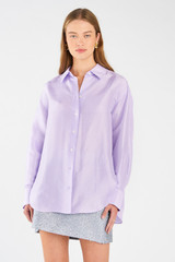 Profile view of model wearing the Oroton Silk Long Sleeve Shirt in Lilac and 100% silk for Women