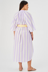 Profile view of model wearing the Oroton Block Stripe Shirt Dress in Lilac and 100% cotton for Women
