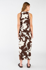Profile view of model wearing the Oroton Silhouette Print Slip Dress in Deep Spice and 100% silk for Women