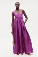 Profile view of model wearing the Oroton Strappy Sundress in Magenta and 100% silk for Women