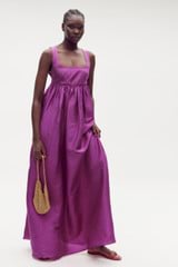 Profile view of model wearing the Oroton Strappy Sundress in Magenta and 100% silk for Women