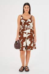 Profile view of model wearing the Oroton Silhouette Print Short in Deep Spice and 100% silk for Women