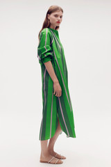 Profile view of model wearing the Oroton Calypso Stripe Shirt Dress in Jewel Green and 100% cotton for Women