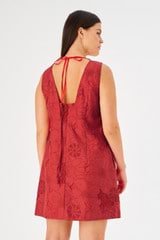 Profile view of model wearing the Oroton Lace Shift Dress in Poppy and 100% polyester for Women