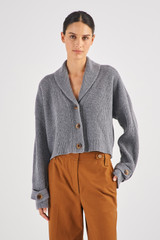 Profile view of model wearing the Oroton Merino Shawl Collar Rib Knit in Mid Grey Marle and 100% Merino Wool for Women