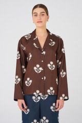 Profile view of model wearing the Oroton Flower Quilt Camp Shirt in Brunette and 100% Silk for Women