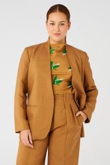Profile view of model wearing the Oroton Single Breasted Blazer in Toffee and 58% viscose, 42% linen for Women