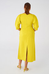 Profile view of model wearing the Oroton Bodice Dress in Vivid Yellow and 58% Viscose, 42% Linen for Women