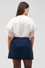 Profile view of model wearing the Oroton Lace Trim Blouse in White and 100% cotton for Women