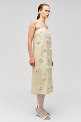 Profile view of model wearing the Oroton Flower Sequin Gown in Limestone and 100% linen for Women