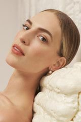 Profile view of model wearing the Oroton Bonnie Bead Drop Earrings in Silver and Sustainably sourced 925 Sterling Silver for Women