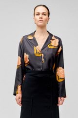 Profile view of model wearing the Oroton Linear Tulip Print Long Sleeve Camp Shirt in Black and 100% silk for Women