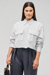 Profile view of model wearing the Oroton Pinstripe Cropped Shirt in White and 100% cotton for Women