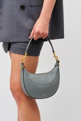 Profile view of model wearing the Oroton Florence Small Shoulder Bag in Grey Flannel and Smooth leather for Women