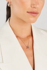 Profile view of model wearing the Oroton Leah Chain Necklace in Silver and Stainless Steel for Women