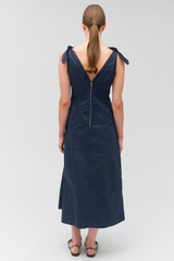 Profile view of model wearing the Oroton Bodice Sundress in North Sea and 100% cotton for Women