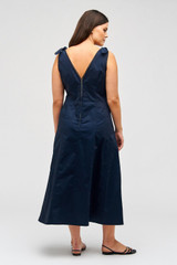 Profile view of model wearing the Oroton Bodice Sundress in North Sea and 100% cotton for Women