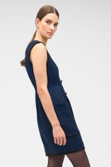 Profile view of model wearing the Oroton Contrast Bind Shift Dress in North Sea and 100% linen for Women
