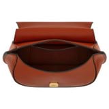 Internal product shot of the Oroton Della Saddle Shoulder Bag in Syrup and Smooth leather for Women
