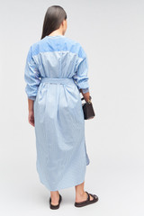 Profile view of model wearing the Oroton Mixed Stripe Shirt Dress in Workwear Blue and 100% cotton for Women