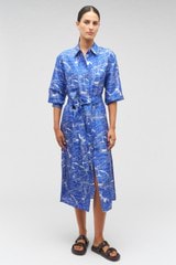 Profile view of model wearing the Oroton Map Print Shirt Dress in Indigo and 100% silk for Women