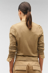 Profile view of model wearing the Oroton Wrap Cardigan in Dark Camel and 100% merino wool for Women