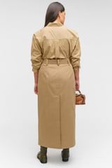 Profile view of model wearing the Oroton Wrap Utility Skirt in Dark Camel and 65% polyester, 35% cotton for Women