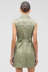 Profile view of model wearing the Oroton Shirt Dress in Sage and 100% cotton for Women