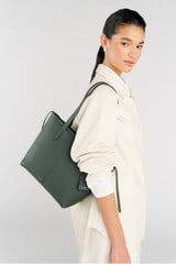 Profile view of model wearing the Oroton Lilly Small Shopper Tote in Fern and Pebble leather for Women